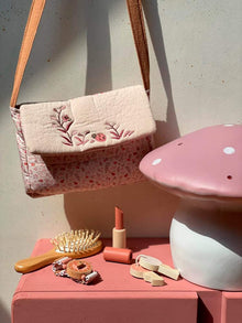 Borsetta con accessori coccinella