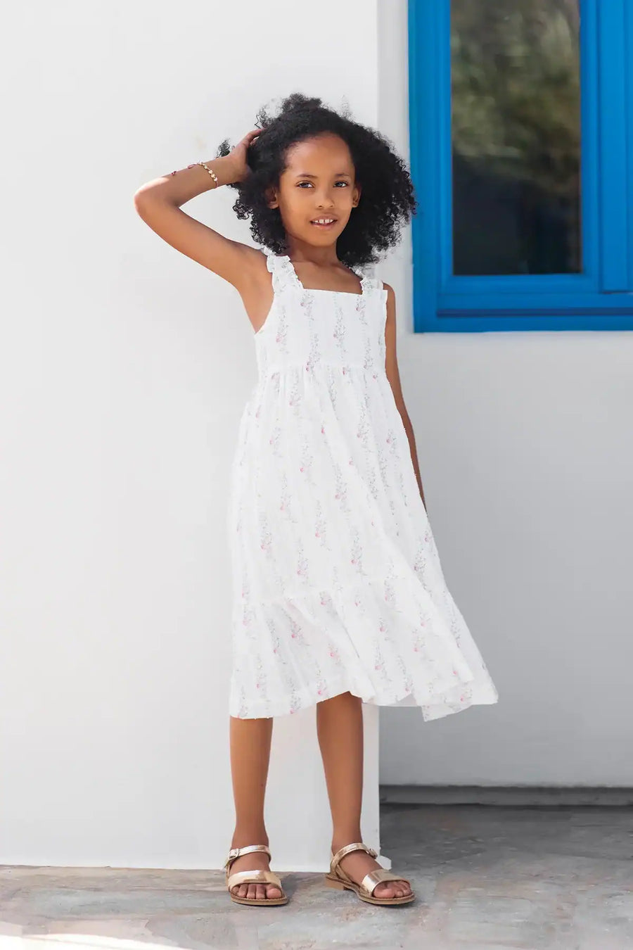 Abito con dettagli floreali