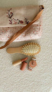 Borsetta con accessori coccinella